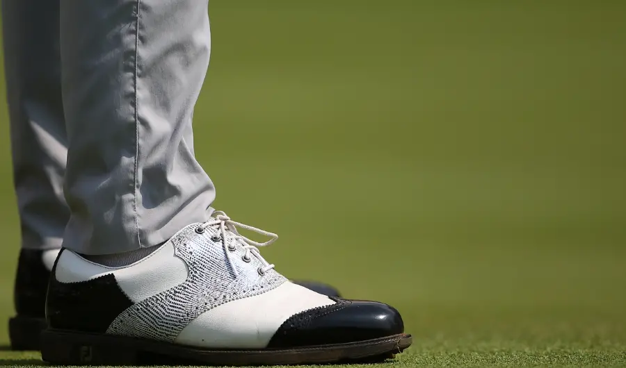 golfer showcasing his shoes