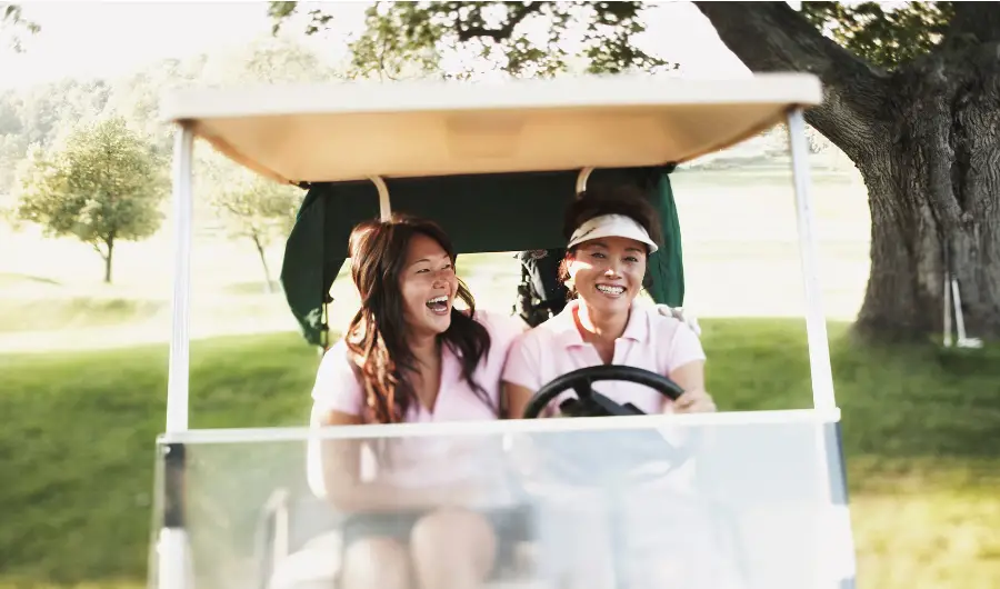 golf cart with a happy family